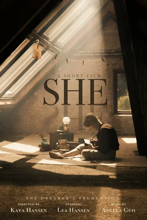 SHE poster